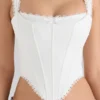 Adina witte stretch katoenen korset-top met geschulpte rand