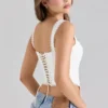 Adina witte stretch katoenen korset-top met geschulpte rand