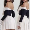 Alana zwarte en crèmekleurige off-shoulder jurk