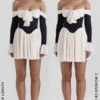 Alana zwarte en crèmekleurige off-shoulder jurk