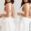 Amalia witte stretch katoenen mini-jurk met strik