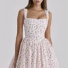 Ami witte mini-korsettenjurk met rozenprint