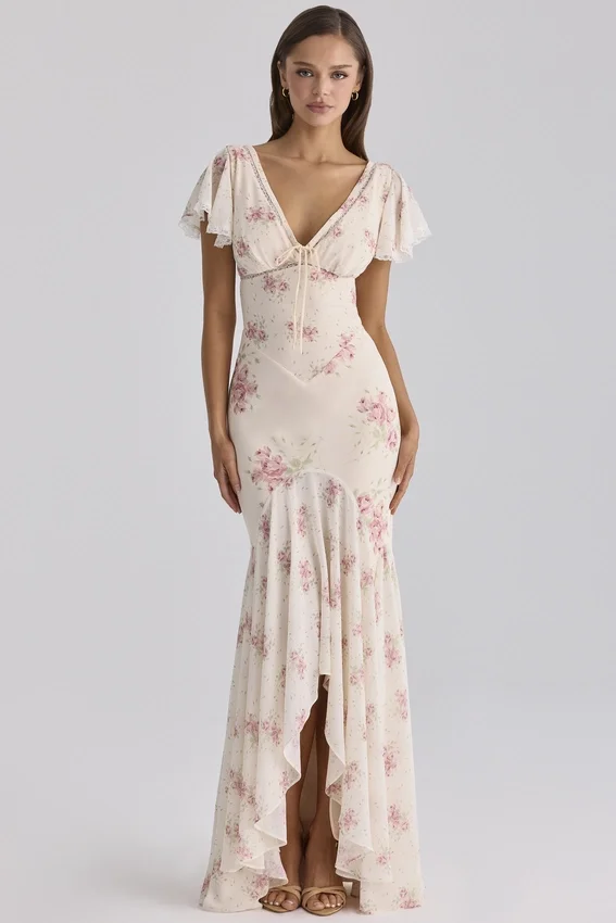 Amina ivoorkleurige maxi-jurk van georgette met vintage rozenprint