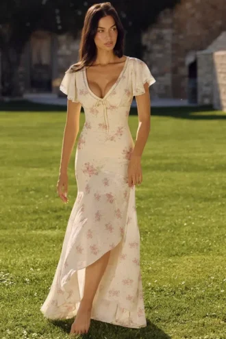 Amina ivoorkleurige maxi-jurk van georgette met vintage rozenprint