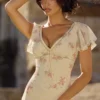 Amina ivoorkleurige maxi-jurk van georgette met vintage rozenprint