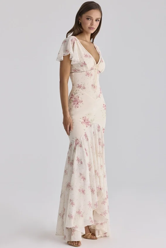 Amina ivoorkleurige maxi-jurk van georgette met vintage rozenprint