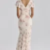 Amina ivoorkleurige maxi-jurk van georgette met vintage rozenprint