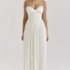 Amorata ivoorkleurige geplooide maxi-jurk