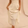 Amorata ivoorkleurige geplooide maxi-jurk