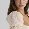 Bambi ivoorkleurige satijnen + broderie anglaise kanten Regency babydoll mini-jurk