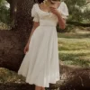 Bella witte babydoll-midi-jurk met broderie anglaise