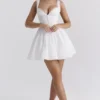 Brigitte witte katoenen mini-jurk met broderie anglaise als onderdeel van het korset