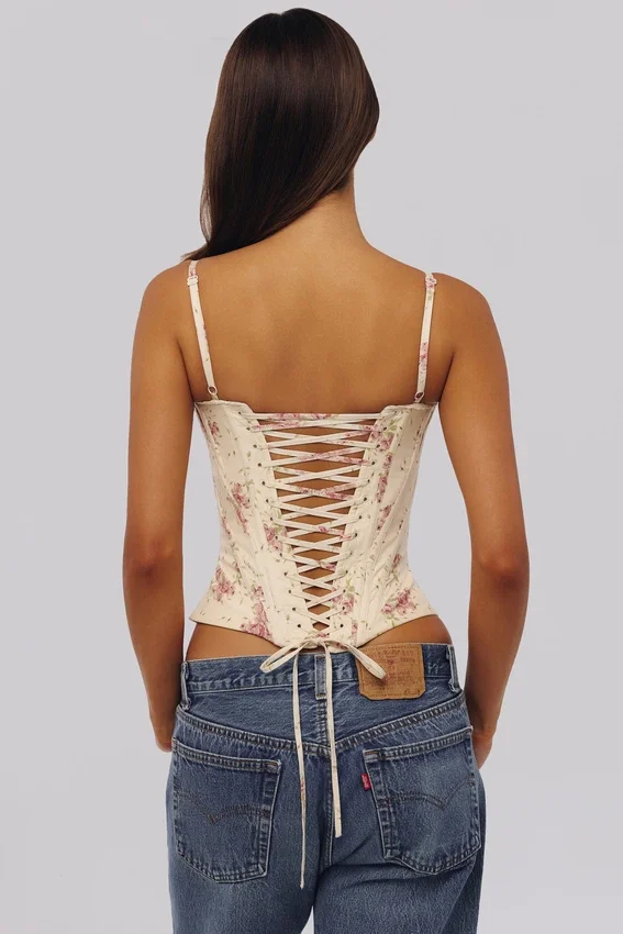 Cadie ivoorkleurige katoen-korset-top met vintage rozenprint