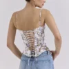 Cadie witte katoenen corset-top met bloemenprint en strik