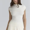 Caia ivoorkleurige bouclé-tops