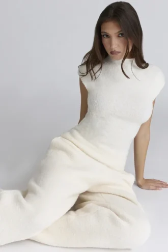 Caia ivoorkleurige bouclé-tops