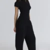 Caia Zwarte bouclé-tops van wol