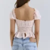 Cara roze kanten peplumtop