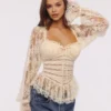 Cara Vintage ivoorkleurige kanten peplumtop met lange mouwen