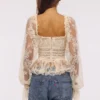 Cara Vintage ivoorkleurige kanten peplumtop met lange mouwen