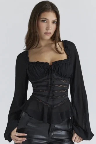 Cara Zwarte Georgette Peplumtop met Lange Mouwen