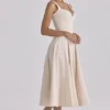 Carlotta Vintage ivoorkleurige twill midi-jurk met silhouet
