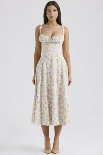 Carmen lichtblauwe katoenen bustier-zomerjurk met weideprint