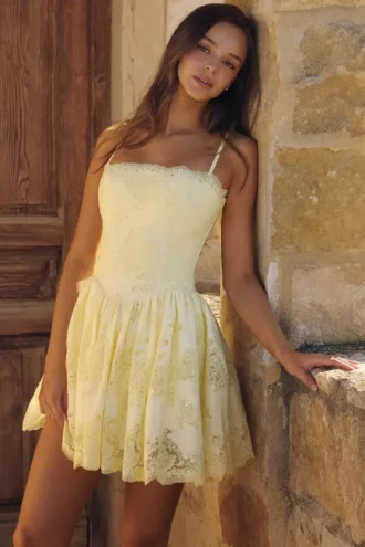 Chloe Lemon mini-jurk van katoen met broderie anglaise