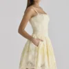 Chloe Lemon mini-jurk van katoen met broderie anglaise