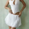 Clarice witte, zwierige mini-rok met laagjes