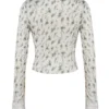 Clarissa top met tuinprint en kanten rand