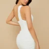 Clementine witte mini-jurk met uitsnijdingen