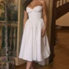 Coco Vintage ivoorkleurige satijnen midi-jurk
