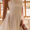 Cosette witte mini-halterjurk met broderie anglaise en katoen