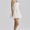 Cosette witte mini-halterjurk met broderie anglaise en katoen
