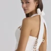Cosette witte mini-halterjurk met broderie anglaise en katoen