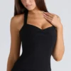 De Peekaboo zwarte halternek-korset-top
