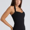 De Peekaboo zwarte halternek-korset-top