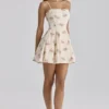 Dolly ivoorkleurige vintage rozenprint katoenen uitlopende mini-zomerjurk