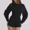Elisetta Zwarte crêpe playsuit met contouren