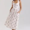 Emilia Crème Midi-jurk met bloemenprint van stretchkatoen en halternek