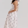 Emilia Crème Midi-jurk met bloemenprint van stretchkatoen en halternek