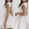 Enchant witte mini-jurk met open rug