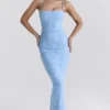 Eva Toscaans blauwe maxi-jurk met geborduurde bloemen