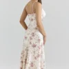 Felicity ivoorkleurige midi-jurk met bloemenprint en schuine snit