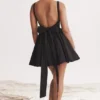 Florianne zwarte mini-jurk met strikken