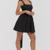 Florianne zwarte mini-jurk met strikken