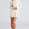 Francesca Vintage crèmekleurige stretch crêpe godet mini-jurk