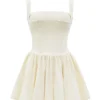 Honor Buttermilk mini-jurk met lintdetails