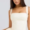 Honor Buttermilk mini-jurk met lintdetails